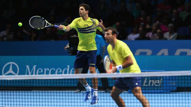 Marcelo Melo do Brasil e Ivan Dodig da Croácia durante partida contra o Bob e Mike Bryan dos Estados Unidos no Barclays ATP World Tour na O2 Arena, em Londres, Inglaterra Marcelo Melo do Brasil e Ivan Dodig da Croácia durante partida contra o Bob e Mike Bryan dos Estados Unidos no Barclays ATP World Tour na O2 Arena, em Londres, Inglaterra