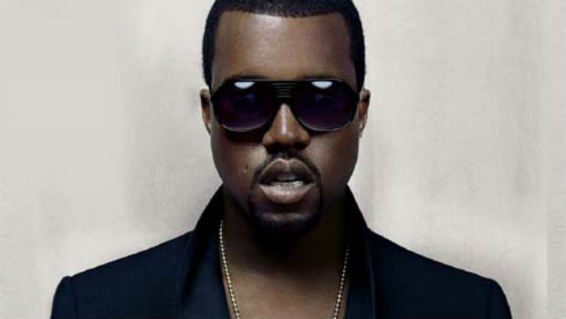 Kanye West usando grillz Kanye West usando grillz