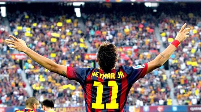 Neymar comemora gol após marcar contra o Real Madri, pelo campeonato espanhol no estádio Camp Nou, em Barcelona'