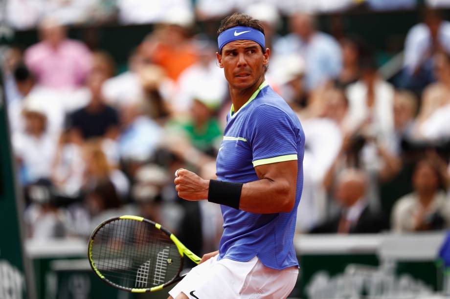 O tenista espanhol Rafael Nadal comemora ponto na final do torneio de Roland Garros contra o suíço Stan Wawrinka - 11/06/2017 O tenista espanhol Rafael Nadal comemora ponto na final do torneio de Roland Garros contra o suíço Stan Wawrinka - 11/06/2017