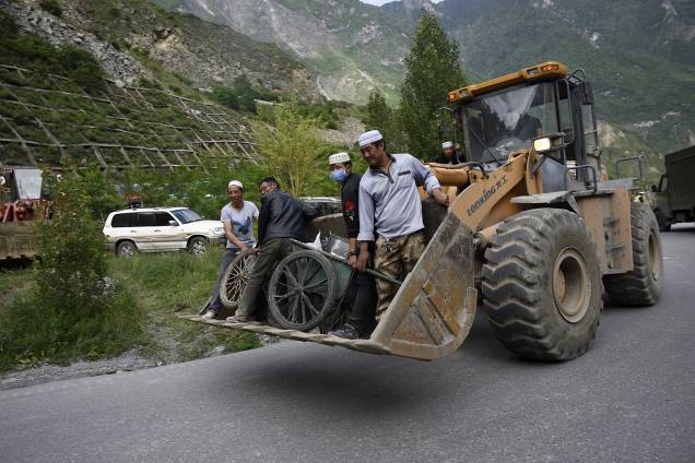 Deslizamento de terra provocado pelas fortes chuvas na região soterrou várias casas no vilarejo de Xinmo, na China - 25/06/2017 Deslizamento de terra provocado pelas fortes chuvas na região soterrou várias casas no vilarejo de Xinmo, na China - 25/06/2017