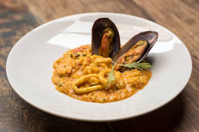 Risoto al mare: prato que compõe menu do jantar no Oliver Risoto al mare: prato que compõe menu do jantar no Oliver