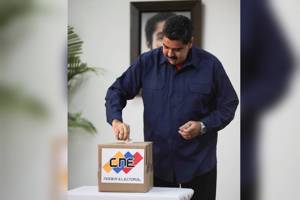 Maduro exclui principais partidos de oposição das presidenciais