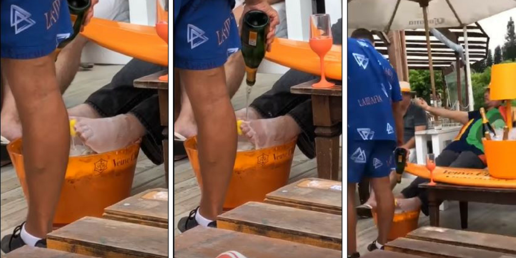 Cenas fortes: garçom lava pé de empresário com champanhe francês