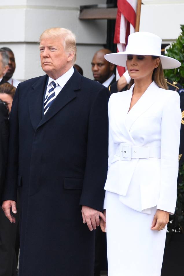O presidente dos Estados Unidos, Donald Trump e a primeira-dama Melania Trump participam de uma cerimônia de boas-vindas ao presidente francês Emmanuel Macron na Casa Branca em Washington - 24/04/2018 O presidente dos Estados Unidos, Donald Trump e a primeira-dama Melania Trump participam de uma cerimônia de boas-vindas ao presidente francês Emmanuel Macron na Casa Branca em Washington - 24/04/2018