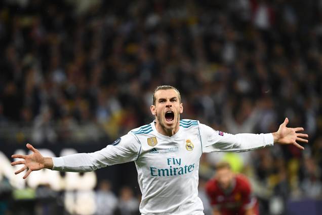O atacante galês do Real Madrid, Gareth Bale, comemora depois de marcar o segundo gol da equipe durante a final da Liga dos Campeões contra o Liverpool - 26/05/2018 O atacante galês do Real Madrid, Gareth Bale, comemora depois de marcar o segundo gol da equipe durante a final da Liga dos Campeões contra o Liverpool - 26/05/2018