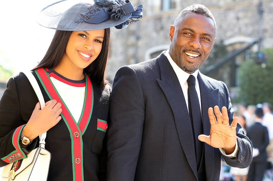 Idris Elba e Sabrina Dhowre chegam no Castelo de Winsdor para o casamento entre o príncipe Harry e a atriz Meghan Markle - 19/05/2018 Idris Elba e Sabrina Dhowre chegam no Castelo de Winsdor para o casamento entre o príncipe Harry e a atriz Meghan Markle - 19/05/2018