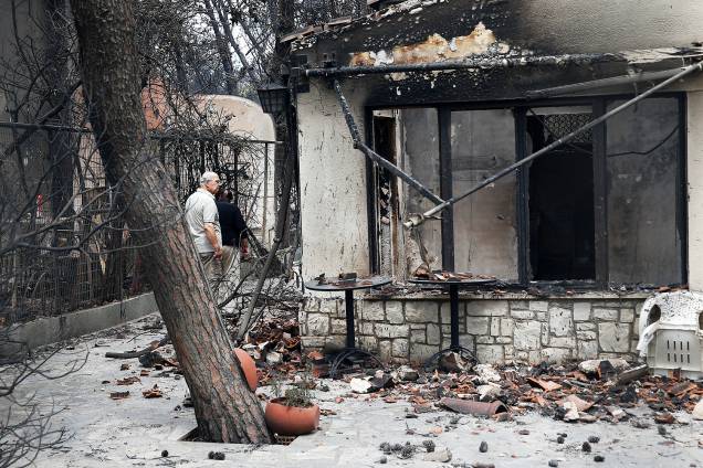 Casa destruída por incêndio florestal no vilarejo de Mati, nos arredores de Atenas, Grécia - 25/07/2018 Casa destruída por incêndio florestal no vilarejo de Mati, nos arredores de Atenas, Grécia - 25/07/2018