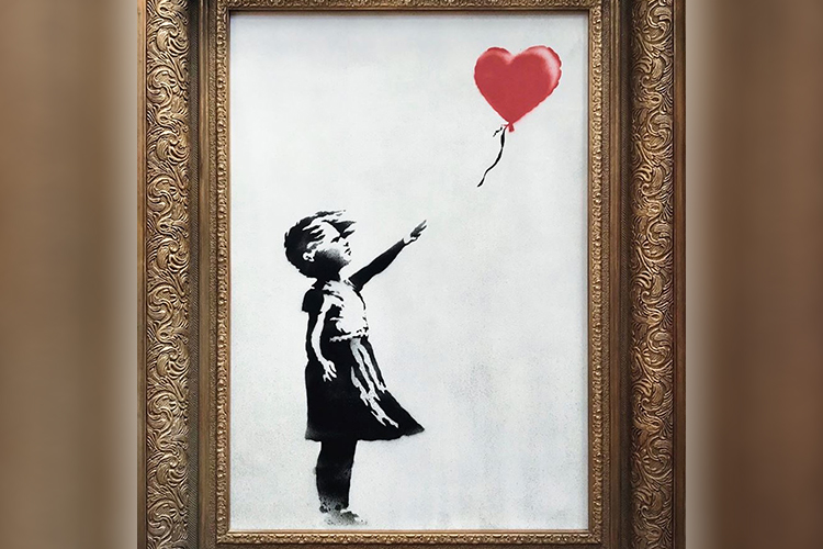 A obra ‘Girl With Balloon’, do artista Banksy A obra ‘Girl With Balloon’, do artista Banksy