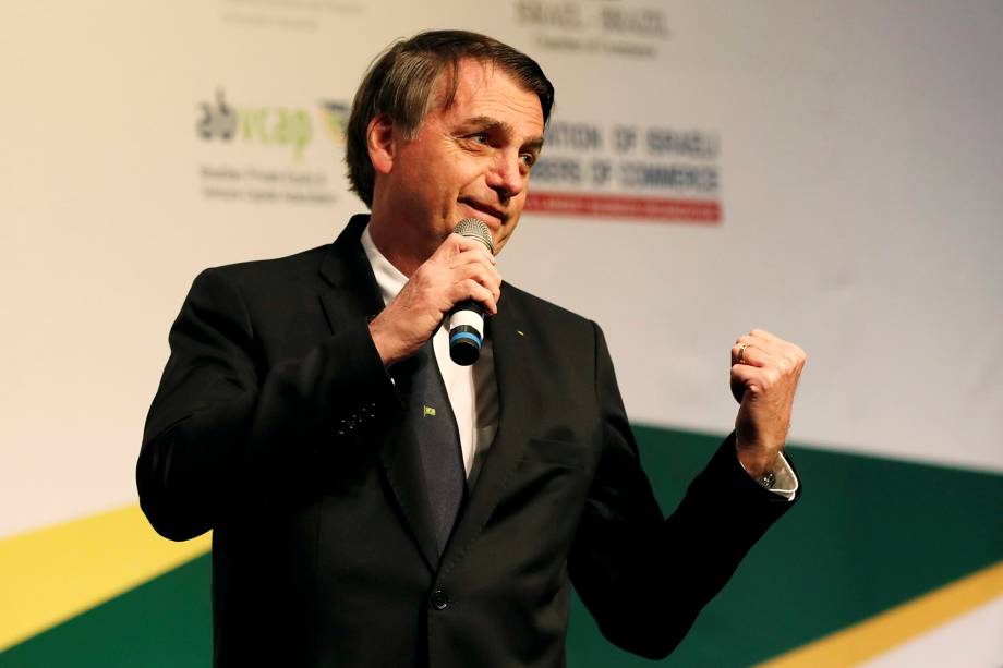 O presidente Jair Bolsonaro fala em um evento com empresários israelenses e brasileiros, com a presença do primeiro-ministro israelense Benjamin Netanyahu, em Jerusalém - 02/04/2019