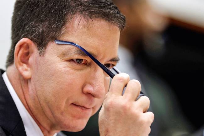 Author and journalist Glenn Greenwald attends a meeting of the human rights committee of the Chamber of Deputies in Brasilia