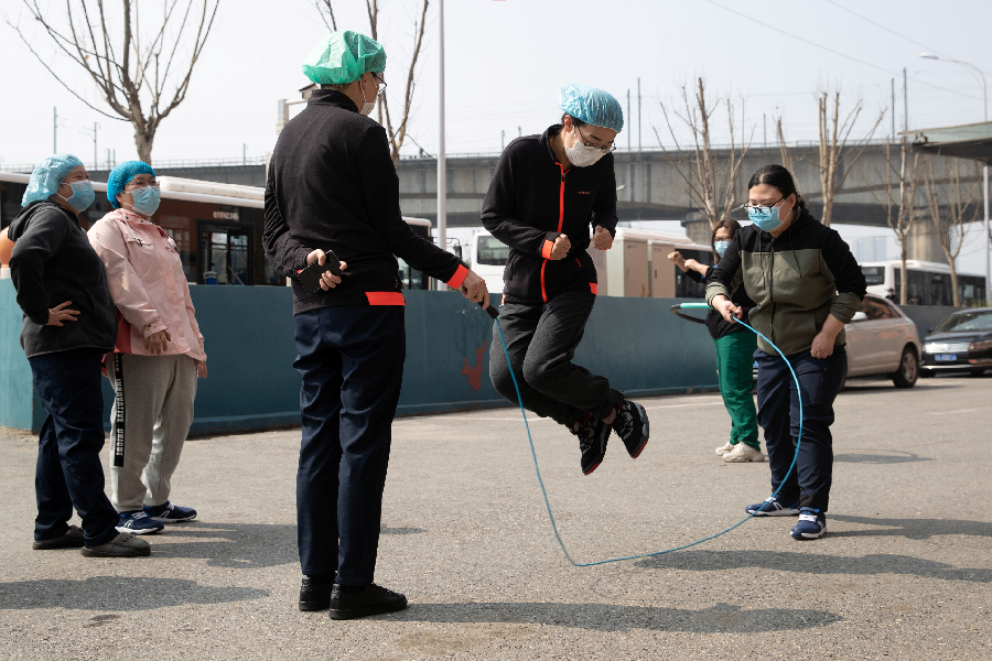 Trabalhadores em Wuhan