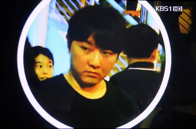 FILE PHOTO: Still image taken from video shows a man believed to be Kim Jong Chol at an Eric Clapton concert in Singapore FILE PHOTO: Still image taken from video shows a man believed to be Kim Jong Chol at an Eric Clapton concert in Singapore