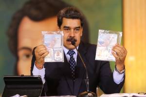 Personal documents are shown by Venezuela’s President Nicolas Maduro during a virtual news conference in Caracas Personal documents are shown by Venezuela’s President Nicolas Maduro during a virtual news conference in Caracas