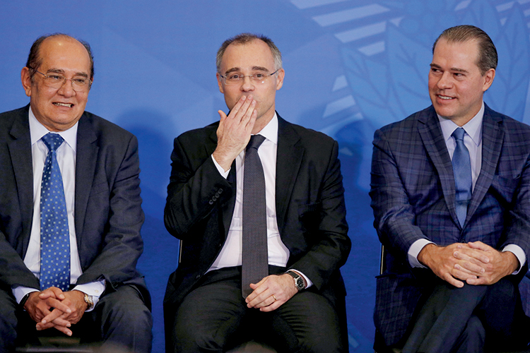 Brazil’s new Justice Minister Andre Luiz de Almeida Mendonca gestures during his swearing in ceremony at the Planalto Palace, amid the coronavirus disease (COVID-19) outbreak, in Brasilia Brazil’s new Justice Minister Andre Luiz de Almeida Mendonca gestures during his swearing in ceremony at the Planalto Palace, amid the coronavirus disease (COVID-19) outbreak, in Brasilia