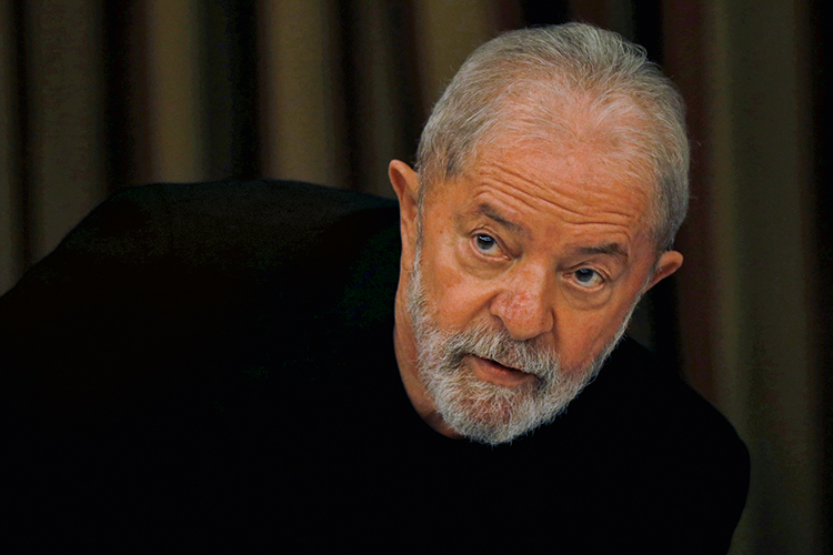 Brazil’s former President Luiz Inacio Lula da Silva looks on during a meeting with members of the Workers Party (PT) in Brasilia Brazil’s former President Luiz Inacio Lula da Silva looks on during a meeting with members of the Workers Party (PT) in Brasilia