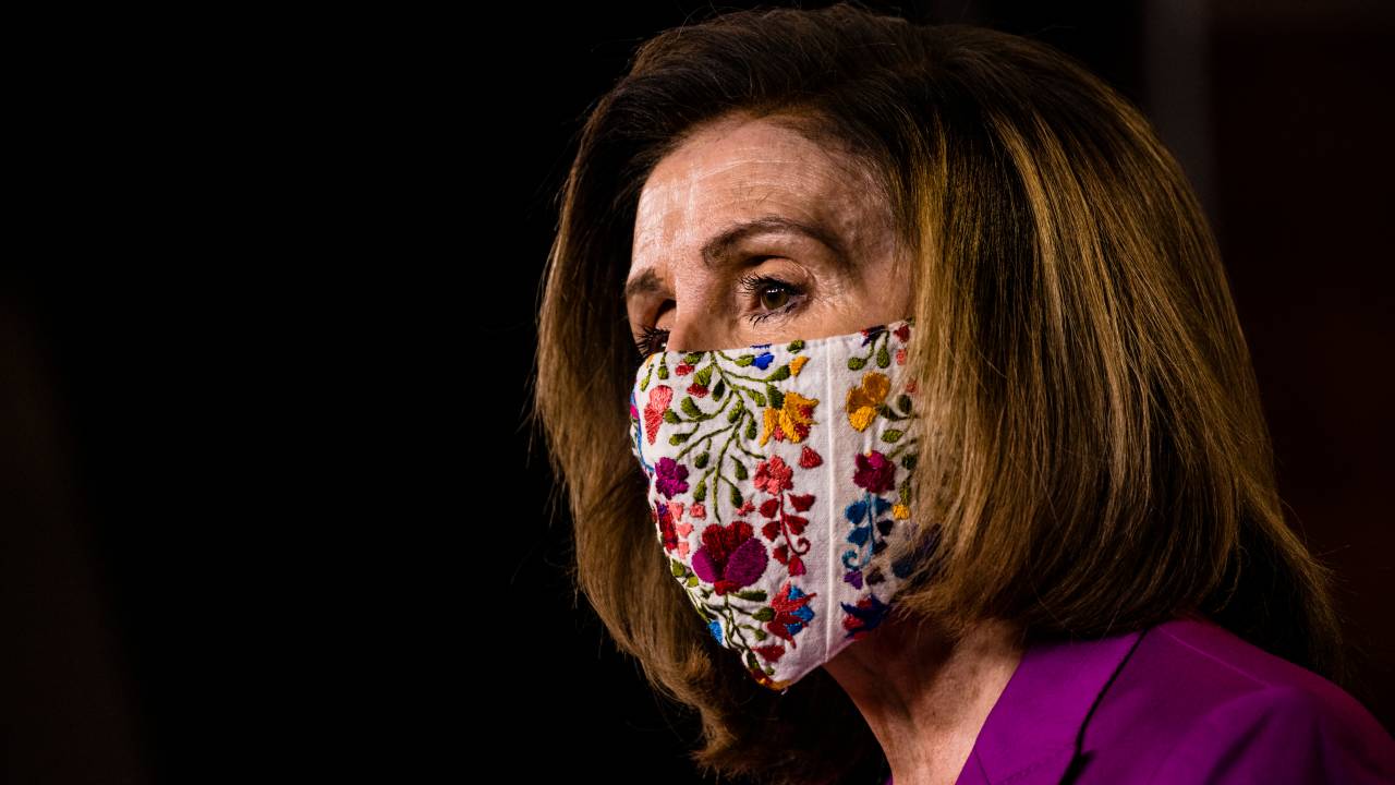 WASHINGTON, DC - JANUARY 07: Speaker of the House Nancy Pelosi calls for the removal of President Donald Trump from office either by invocation of the 25th Amendment by Vice President Mike Pence and a majority of the Cabinet members or Impeachment at the U.S. Capitol on January 7, 2021 in Washington, DC. Following a rally yesterday with President Donald Trump on the National Mall, a pro-Trump mob stormed and broke into the U.S. Capitol building causing the Joint Session of Congress to delay the certification of President-elect Joe Bidens victory over President Trump. Samuel Corum/Getty Images/AFP