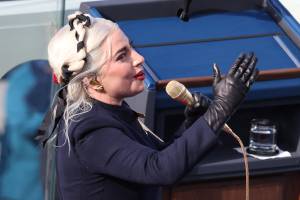 WASHINGTON, DC - JANUARY 20: Lady Gaga sings the National Anthem at the inauguration of U.S. President-elect Joe Biden on the West Front of the U.S. Capitol on January 20, 2021 in Washington, DC. During today's inauguration ceremony Joe Biden becomes the 46th president of the United States. Tasos Katopodis/Getty Images/AFP