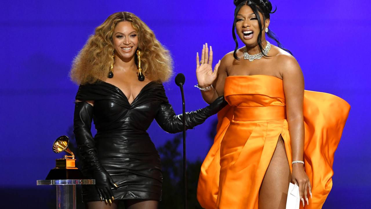 LOS ANGELES, CALIFORNIA - MARCH 14: (L-R) Beyoncé and Megan Thee Stallion accept the Best Rap Performance award for 'Savage' onstage during the 63rd Annual GRAMMY Awards at Los Angeles Convention Center on March 14, 2021 in Los Angeles, California. (Photo by Kevin Winter/Getty Images for The Recording Academy)