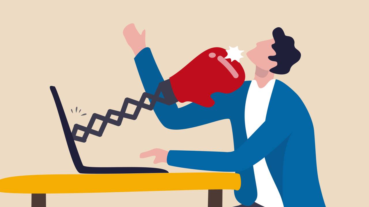 Cyber bullying, online harassment using social media to threatened people, violent using electronic means concept, sad man using social media and being punched by boxing gloves from computer laptop.