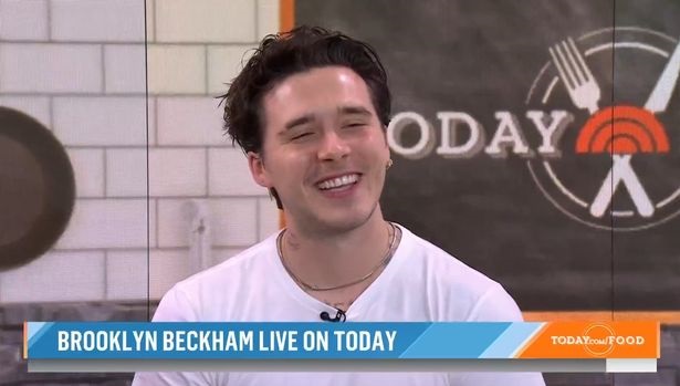A imagem mostra Brooklyn Beckham, filho de David Beckham