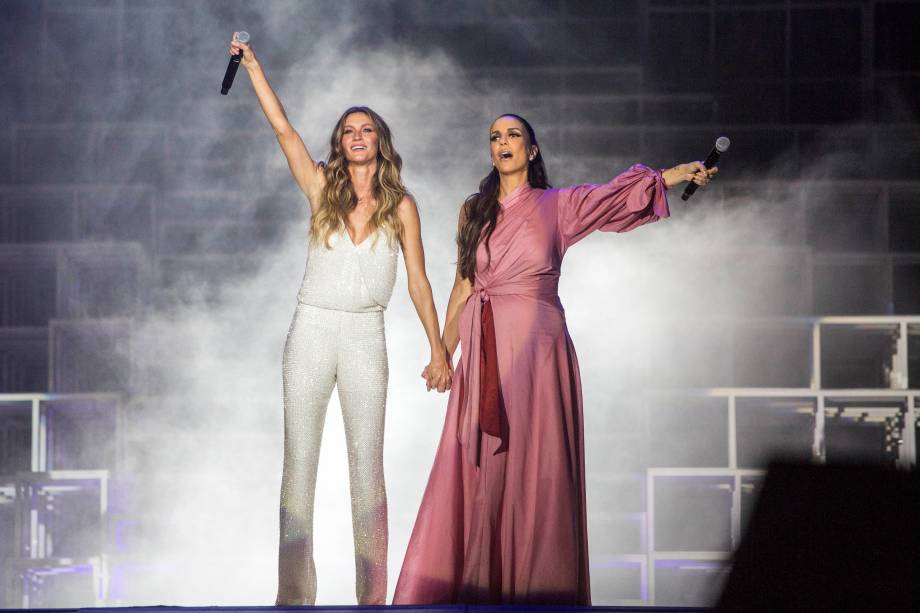 A modelo Gisele Bündchen e a cantora Ivete Sangalo no primeiro dia de Rock in Rio, Rio de janeiro, 2017. A modelo Gisele Bündchen e a cantora Ivete Sangalo no primeiro dia de Rock in Rio, Rio de janeiro, 2017.