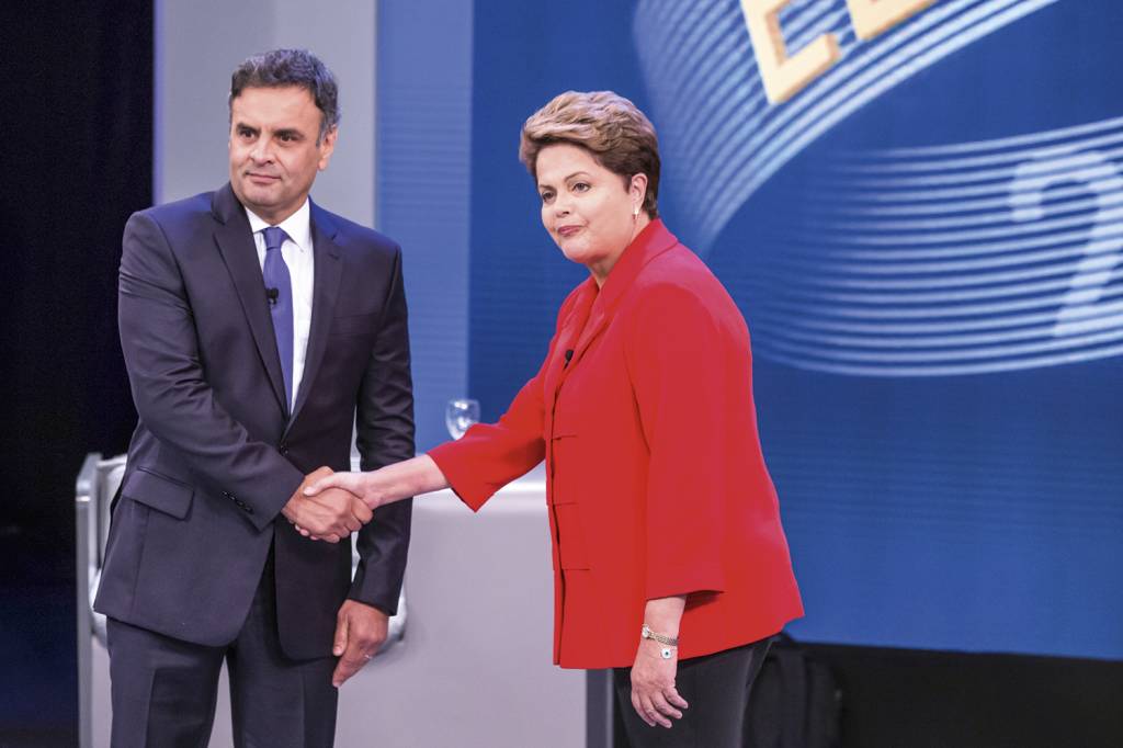 AECIO-NEVES-DILMA-ROUSSEFF-DEBATE-GLOBO-2014-166.jpg INIMIGOS - Aécio e Dilma em 2014: ponto baixo da relação entre os dois partidos -