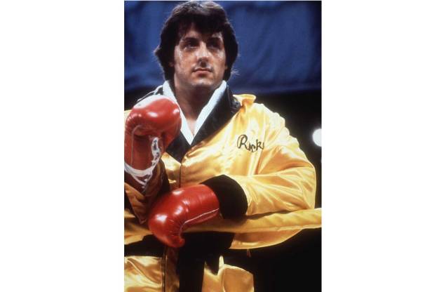 Sylvester Stallone no filme "Rocky - Um Lutador", de John G. Avildsen, 1976. Sylvester Stallone no filme "Rocky - Um Lutador", de John G. Avildsen, 1976.