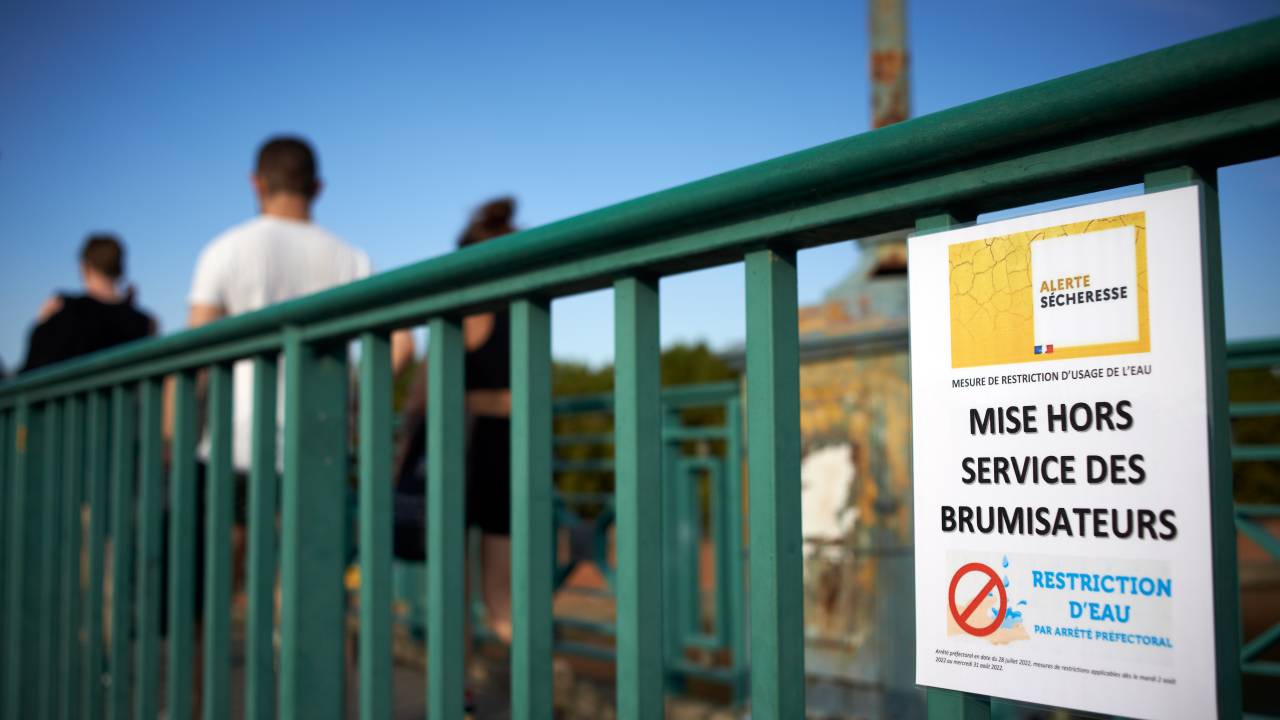A sign reads 'Drought Alert. Water spayers out of service. Water restrictions'. France is again suffocating as another heatwave begins. Temperatures will hoover near heat records especially in the south. France is 4 to 10°C above normal temperatures for August. In July, rain was 88% less abundant than normal : France is experiencing its worst drought since rain records began in 1959. SW of France and Toulouse are enduring another round of scorching heat. It's the 4nd heatwave in France in 2022, one in the spring in May, and 3 during this summer (to date). Water restrictions are in place in all France, someplaces haven't drinking water and must be resupply with trucks. In Toulouse, water sprayers have to close due to water restrictions. Toulouse. August 4th 2022. (Photo by Alain Pitton/NurPhoto via Getty Images)