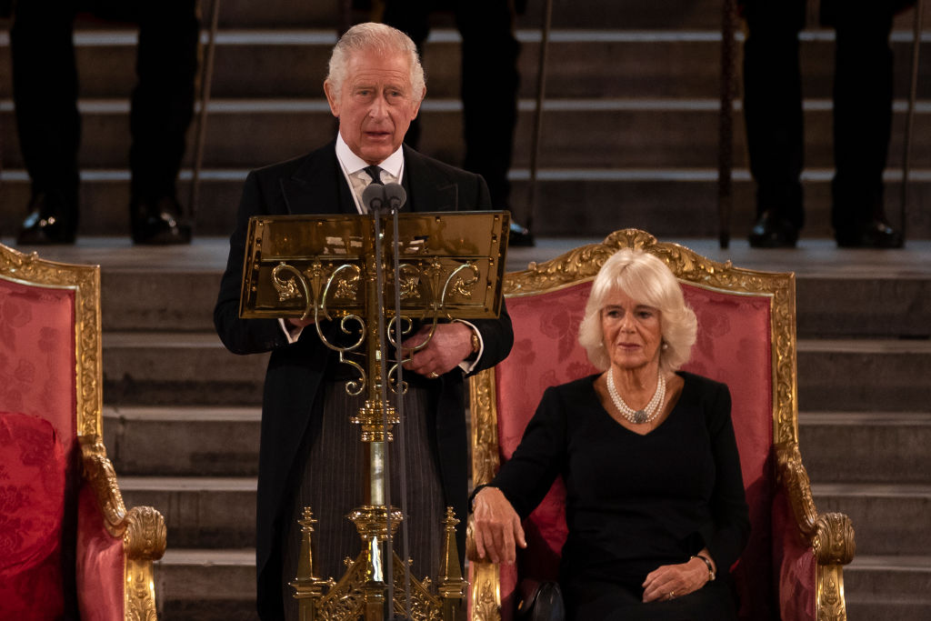 LONDON, ENGLAND - SEPTEMBER 12: King Charles III and Camilla, Queen Consort take part in an address in Westminster Hall on September 12, 2022 in London, England. The Lord Speaker and the Speaker of the House of Commons presented an Address to His Majesty on behalf of their respective House in Westminster Hall following the death of Her Majesty Queen Elizabeth II. The King replied to the Addresses. Queen Elizabeth II died at Balmoral Castle in Scotland on September 8, 2022, and is succeeded by her eldest son, King Charles III. (Photo by Dan Kitwood/Getty Images)
