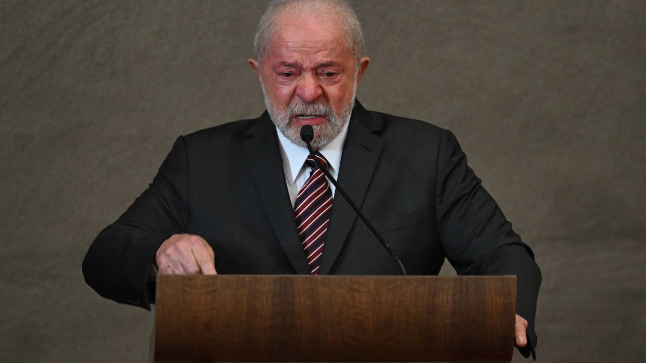 Brazil's President-elect Luiz Inacio da Silva cries while delivering a speech during the certification ceremony at the Superior Electoral Court (TSE) headquarters in Brasilia, December 12, 2022. - Lula da Silva and Geraldo Alckmin will take office on January 1, 2023. (Photo by EVARISTO SA / AFP)