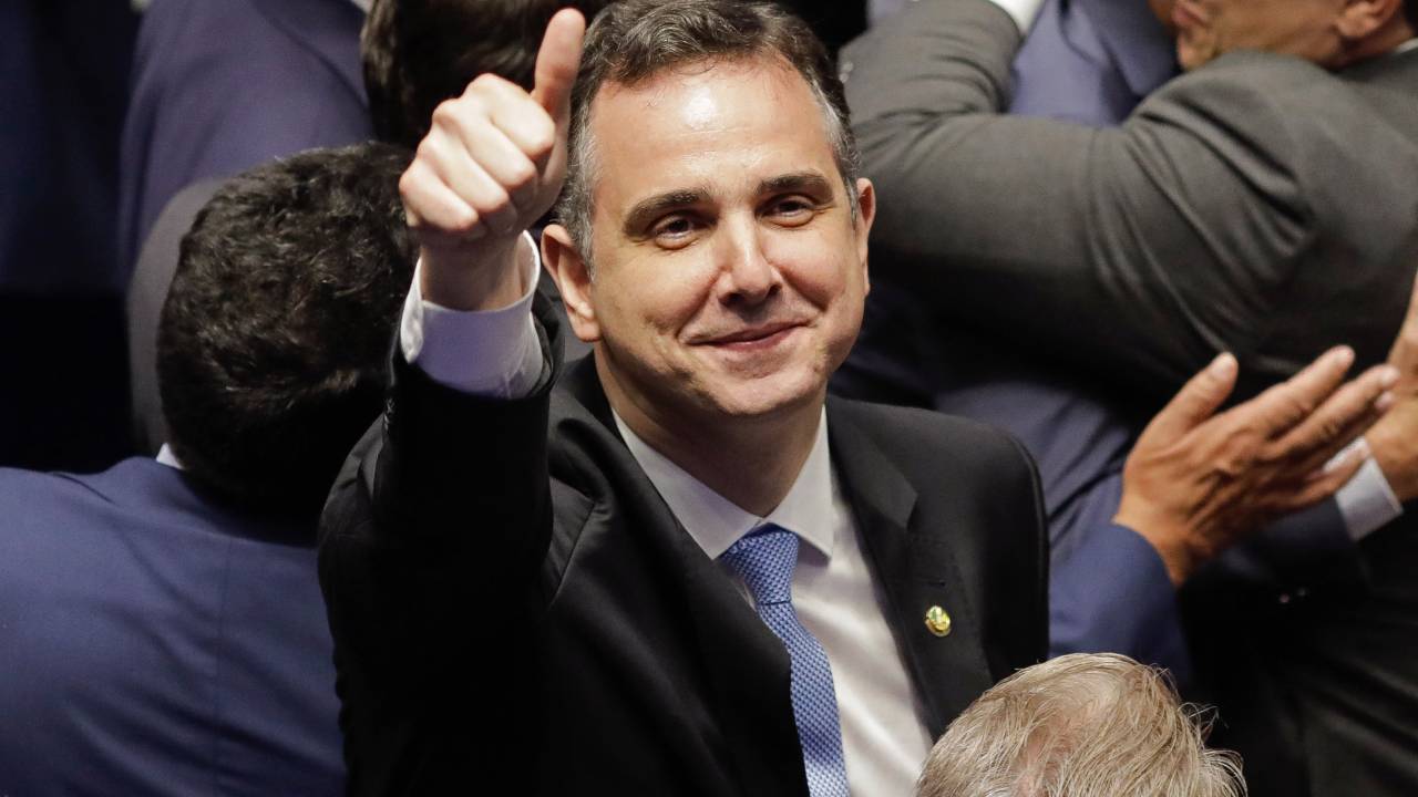 President of Brazil's Federal Senate, Rodrigo Pacheco, gestures during the swearing-in ceremony of the new Brazilian senate at the Federal Senate plenary in Brasilia on February 1, 2023. (Photo by Sergio Lima / AFP)