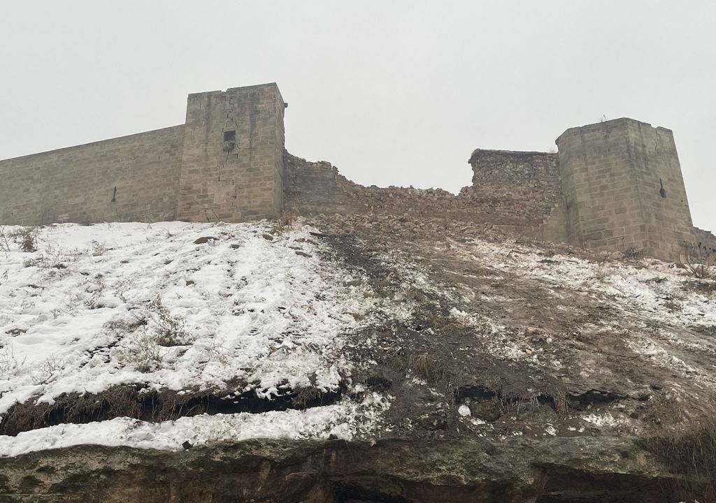 GAZIANTEP, TURKIYE - FEBRUARY 06: A view of damaged historical Gaziantep Castle after a 7.4 magnitude earthquake hit southern provinces of Turkiye, in Gaziantep, Turkiye on February 6, 2023. The 7.4 magnitude earthquake jolted Turkiye's southern province of Kahramanmaras early Monday, according to Turkiye's Disaster and Emergency Management Authority (AFAD). It was followed by a magnitude 6.4 quake that struck southeastern Gaziantep province. A third earthquake with a 6.5 magnitude also hit Gaziantep. Earthquakes had affected several provinces including, Osmaniye, Malatya, Adıyaman, Adana, Diyarbakır, Kilis and Sanliurfa. (Photo by Mehmet Akif Parlak/Anadolu Agency via Getty Images)
