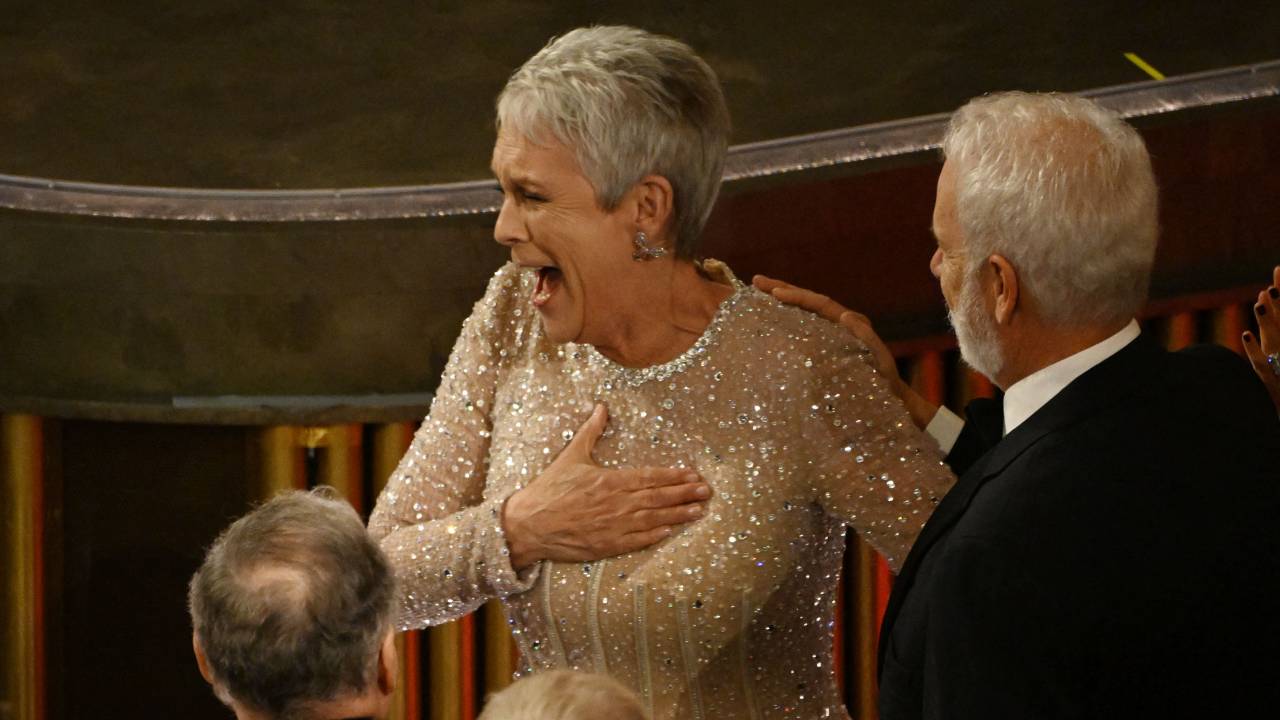 US actress Jamie Lee Curtis celebrates after winning the Oscar for Best Actress in a Supporting Role for "Everything Everywhere All at Once" during the 95th Annual Academy Awards at the Dolby Theatre in Hollywood, California on March 12, 2023. (Photo by Patrick T. Fallon / AFP)