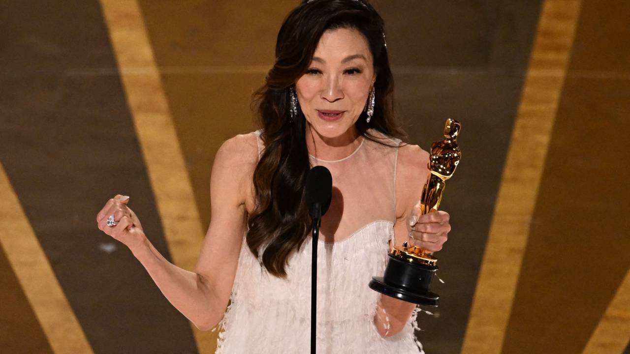 Malaysian actress Michelle Yeoh accepts the Oscar for Best Actress in a Leading Role for "Everything Everywhere All at Once" onstage during the 95th Annual Academy Awards at the Dolby Theatre in Hollywood, California on March 12, 2023. (Photo by Patrick T. Fallon / AFP)