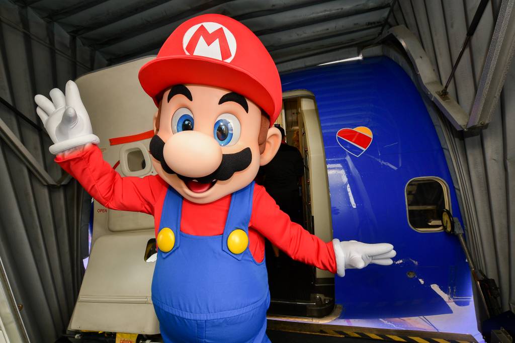 Nintendo Of America And Southwest Airlines Partnership 7.17.19 SAN DIEGO, CALIFORNIA - JULY 17: Mario poses for a photo for the Nintendo of America and Southwest Airlines Partnership at San Diego International Airport on July 17, 2019 in San Diego, California. (Photo by Matt Winkelmeyer/Getty Images for Nintendo)