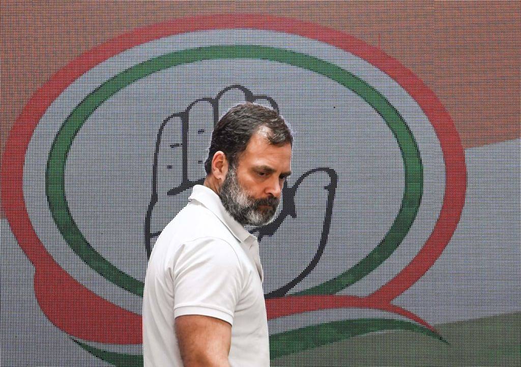 NEW DELHI, INDIA - MARCH 16: Congress leader Rahul Gandhi arrives to briefs the media personnel at AICC , at 24 Akbar Road on March 16, 2023 in New Delhi, India. Attacking the BJP, Rahul Gandhi said that the government and the PM are scared of the Adani case, so they have prepared this 'tamasha'. I think I will not be allowed to speak in Parliament. (Photo by Vipin Kumar/Hindustan Times via Getty Images)