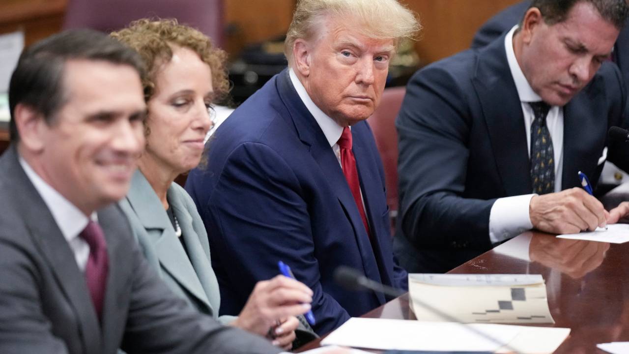 NEW YORK, NEW YORK - APRIL 04: Flanked by attorneys, former U.S. President Donald Trump appears in the courtroom for his arraignment proceeding at Manhattan Criminal Court on April 4, 2023, in New York City. Trump was arraigned during his first court appearance today following an indictment by a grand jury that heard evidence about money paid to adult film star Stormy Daniels before the 2016 presidential election. With the indictment, Trump becomes the first former U.S. president in history to be charged with a criminal offense. Seth Wenig-Pool/Getty Images/AFP (Photo by POOL / GETTY IMAGES NORTH AMERICA / Getty Images via AFP)