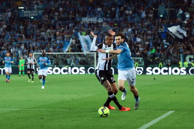 UDINE, ITALY - MAY 04: Khvicha Kvaratskhelia of SSC Napoli tumbles in the area as he is challenged by Rodrigo Becao of Udinese Calcio during the Serie A match between Udinese Calcio and SSC Napoli at Dacia Arena on May 04, 2023 in Udine, Italy. (Photo by Jonathan Moscrop/Getty Images)