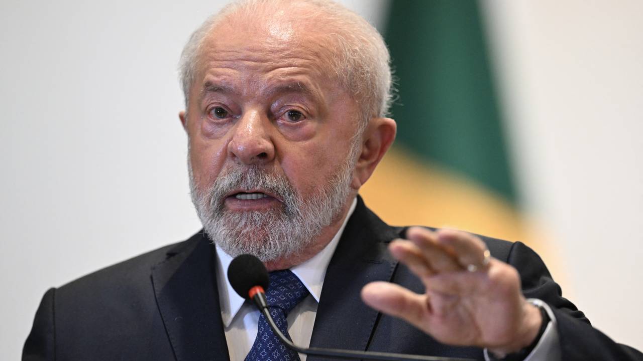 (FILES) Brazilian President Luiz Inacio Lula da Silva speaks to the press after a summit of South American leaders, at Itamaraty Palace in Brasilia on May 30, 2023. President Luiz Inacio Lula da Silva has been in diplomatic hyperdrive since taking office, making Brazil a key global player again -- but stoking controversy with some of his stances, including on Ukraine and Venezuela. Less than six months into his term, the veteran leftist has already met more foreign leaders than his predecessor, far-right ex-president Jair Bolsonaro, did in four years -- 33 to 32, according to a count by newspaper O Globo. (Photo by EVARISTO SA / AFP)