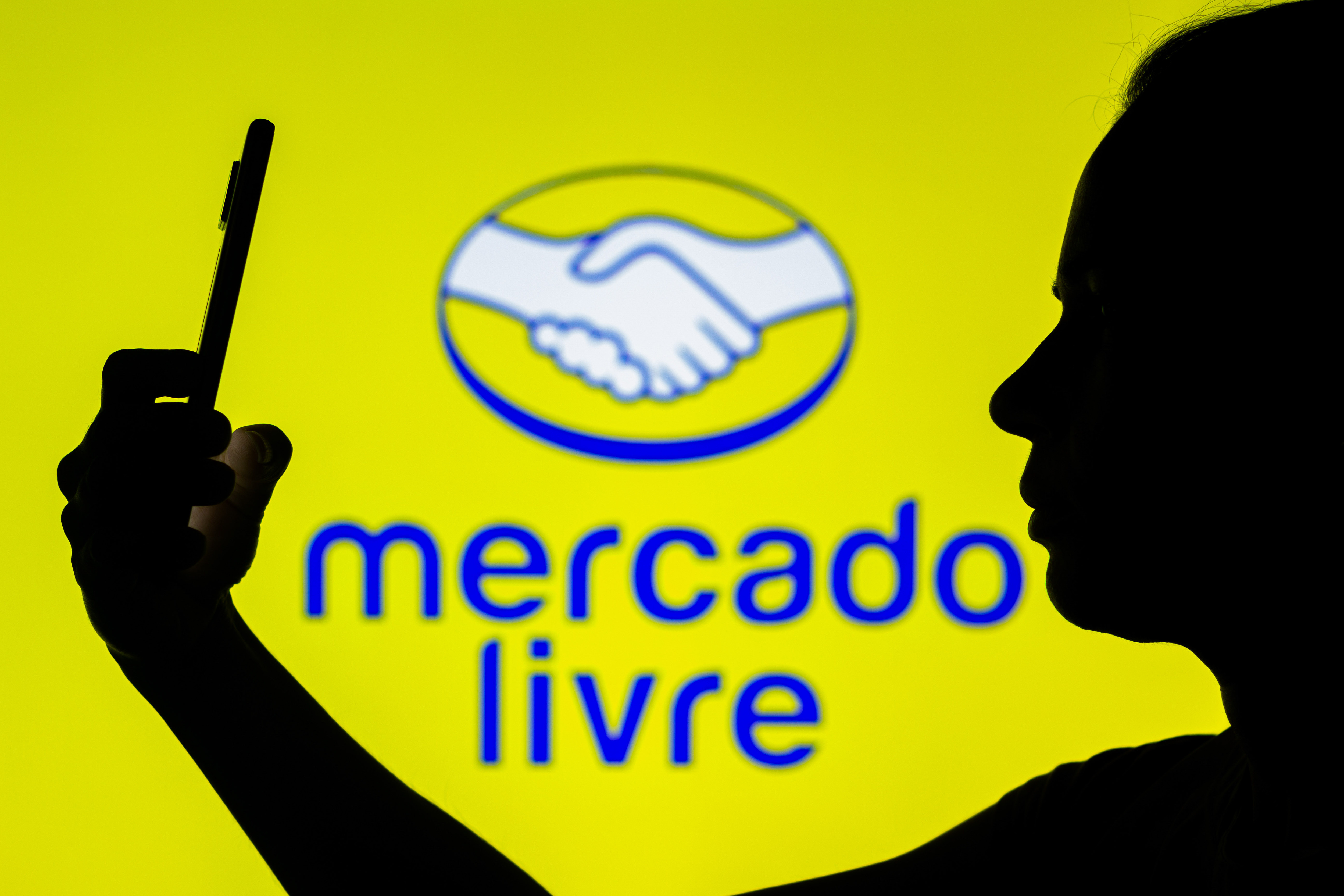 In this photo illustration, the Mercado Livre logo is seen