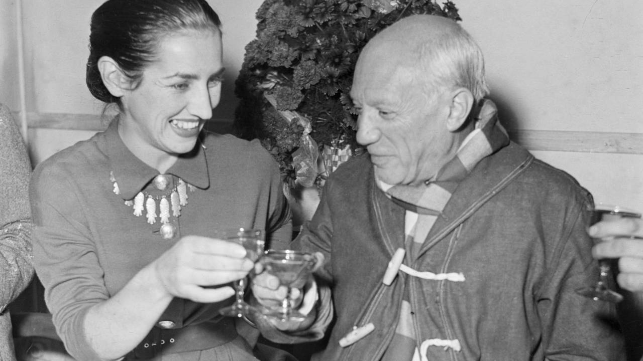 (Original Caption) 10/31/1951-Vallauris, France: Pablo Picasso, famed Spanish painter, born at Malaga on Oct. 25, 1881, clinks glasses with his wife, Francoise, as they toast the artist's 70th birthday during an intimate ceremony held at their home. The Picasso family, including two children, Claude, 5, and Paloma, 2, lives in the small Riviera town of Vallauris, in Southern France.
