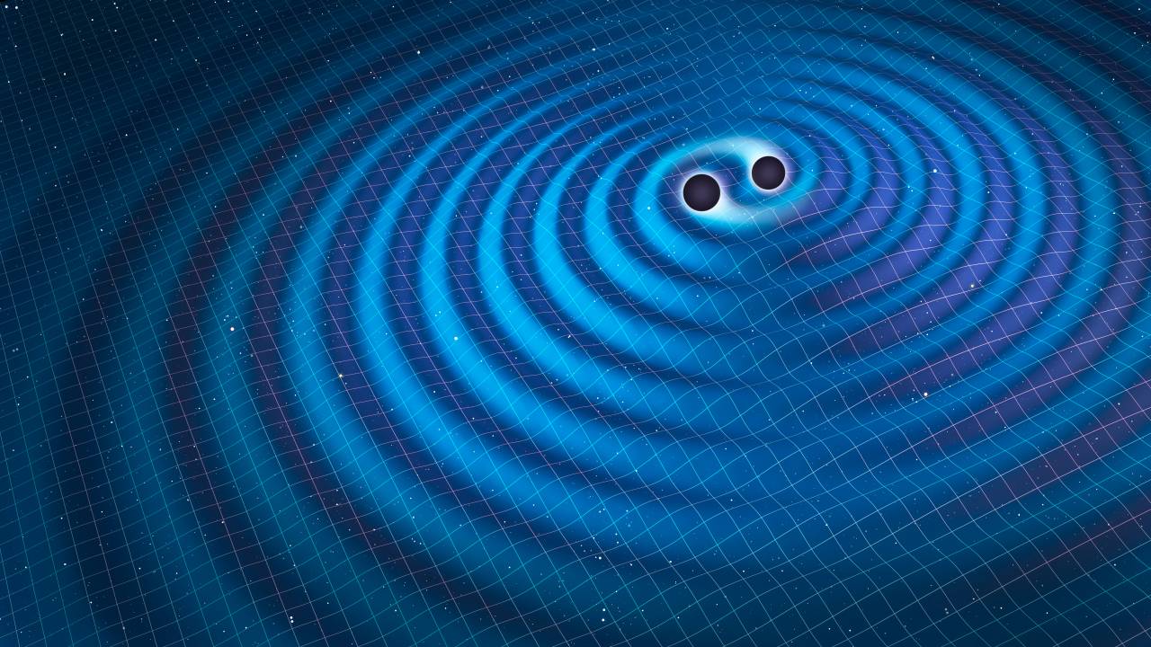 Ao se fundirem, buracos negros distorcem o espaço-tempo