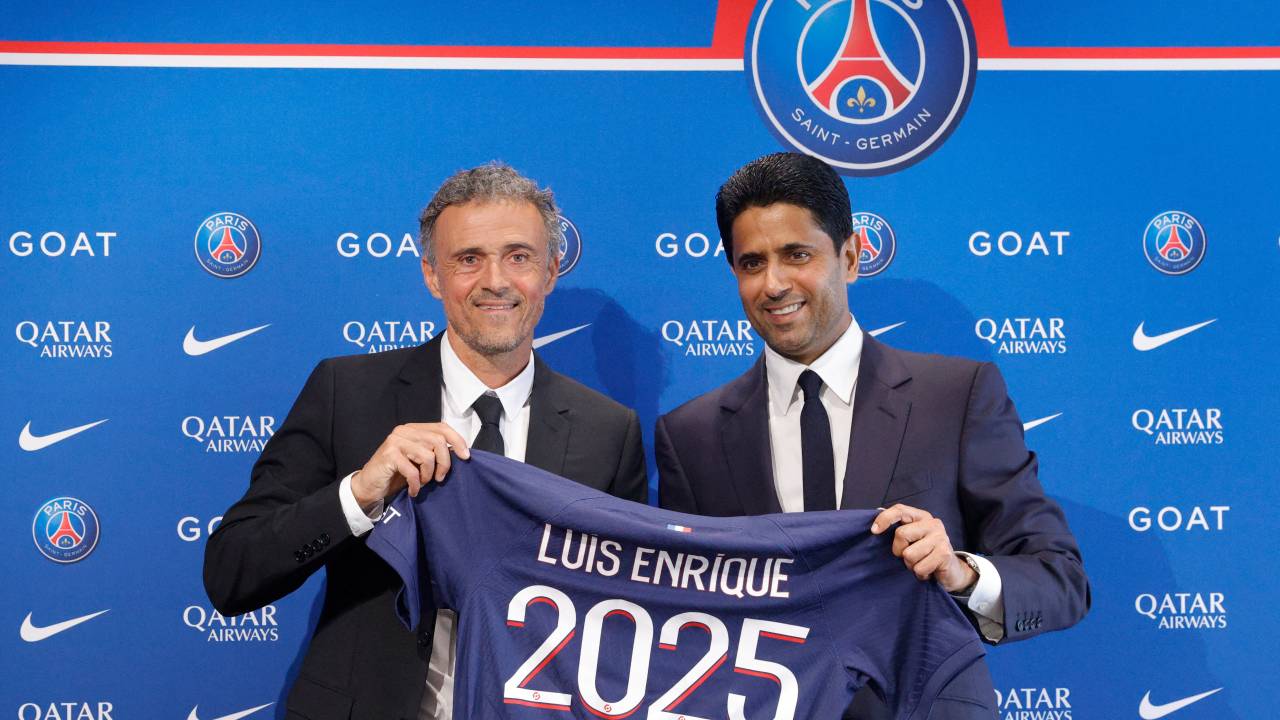 Paris Saint-Germain's newly appointed Spanish head coach Luis Enrique (L) and Paris Saint Germain's Qatari president Nasser al-Khelaifi pose during a press conference to announce the presentation of the new coach, at the new 'campus' of French L1 Paris Saint-Germain (PSG) football club at Poissy, west of Paris on July 5, 2023. Former Barcelona and Spain coach Luis Enrique has been appointed as the new coach of Paris Saint-Germain on a two-year deal, the French champions announced on July 5, 2023. (Photo by Geoffroy Van der Hasselt / AFP)