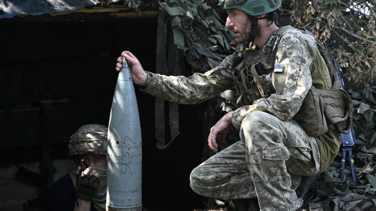 Ukrainian artillerymen prepare 152 mm projectiles for artillery at a position on the front line near Bakhmut, eastern Ukraine, on July 20, 2023, amid the Russian invasion of Ukraine. (Photo by Genya SAVILOV / AFP)