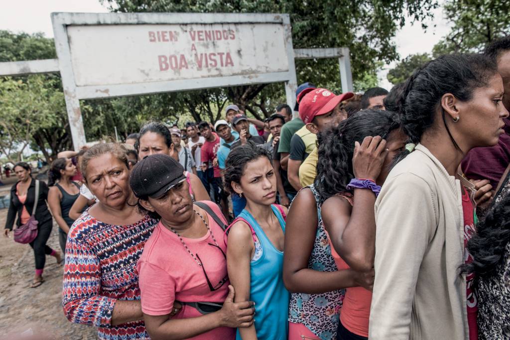 Xenophobia Haunts Venezuelan Refugees Fleeing Economic Collapse VIDA DURA - Travessia na fronteira: um grupo ainda pena para se estabelecer