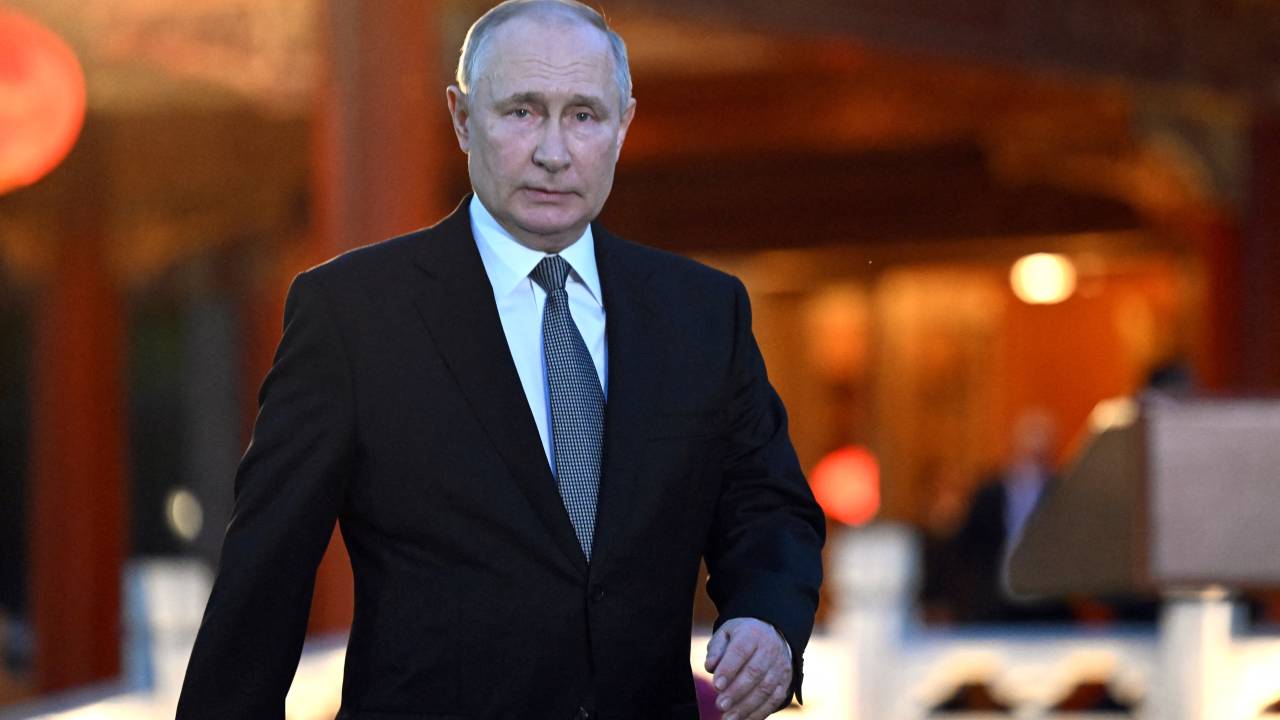 This pool photograph distributed by Russian state owned agency Sputnik shows Russia's President Vladimir Putin meeting with Russian journalists after the third Belt and Road Forum for International Cooperation in Beijing on October 18, 2023. (Photo by Sergei GUNEYEV / POOL / AFP)