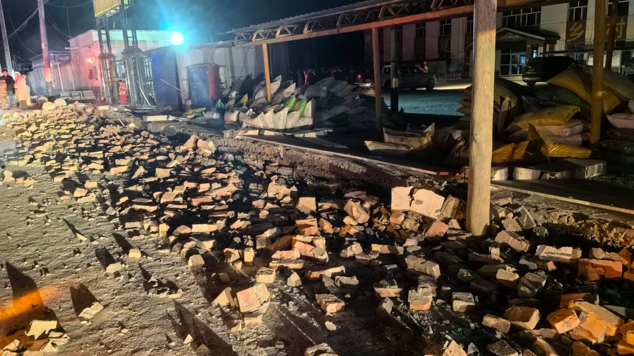 The rubble of houses damaged by a magnitude 7.1 earthquake is seen on a street in Wushi County, Aksu prefecture, in Chinas northwestern Xinjiang region on January 23, 2024. (Photo by CNS / AFP) / China Out