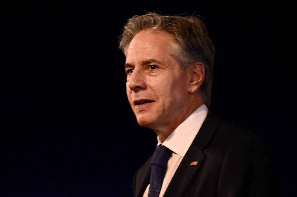 US Secretary of State Antony Blinken gestures on arrival at Brasília Air Base, Brazil, on February 20, 2024. Blinken is on a three-day visit to the country, where he will meet President Luiz Inácio Lula da Silva and take part in the G20 Foreign Ministers meeting. (Photo by EVARISTO SA / AFP)