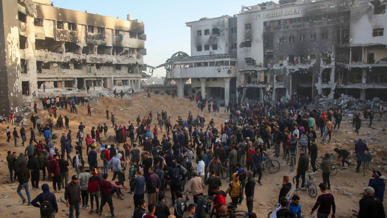 Palestinians inspect the damage at Gaza's Al-Shifa hospital after the Israeli military withdrew from the complex housing the hospital on April 1, 2024, amid the ongoing battles Israel and the Hamas militant group. (Photo by AFP)